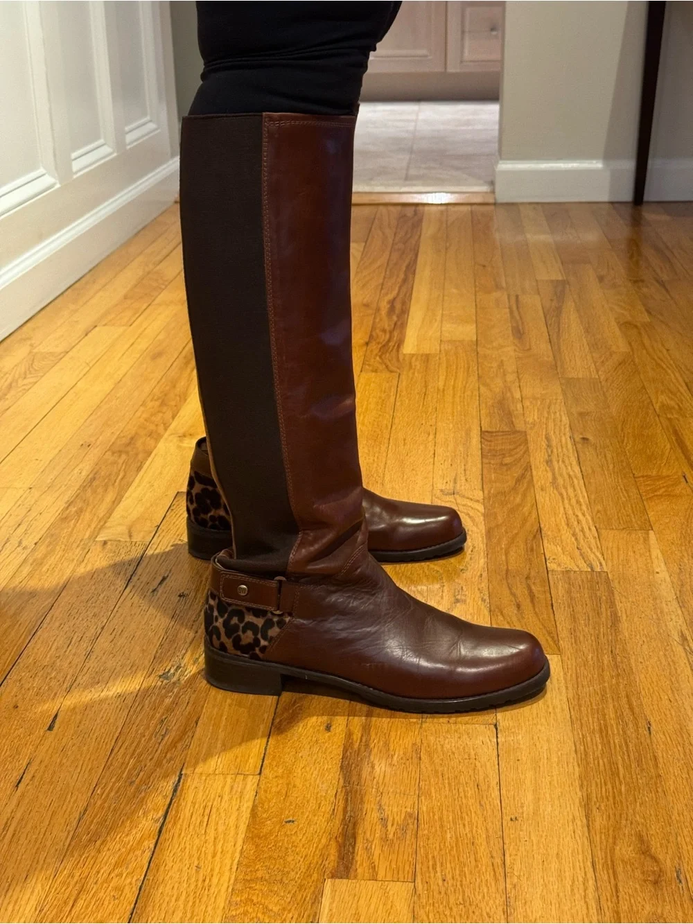 Women's Brown Leather Knee-High Riding Boots with Leopard Accent Stuart Weitzman